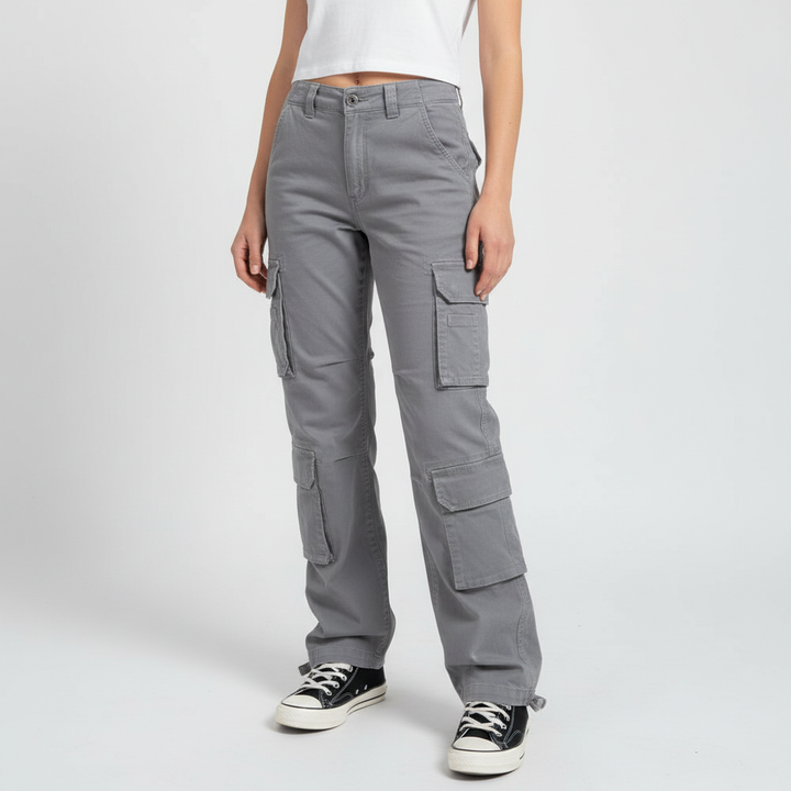 Back view of women's blue baggy cargo pants, loose fit, showing pocket placement and relaxed silhouette