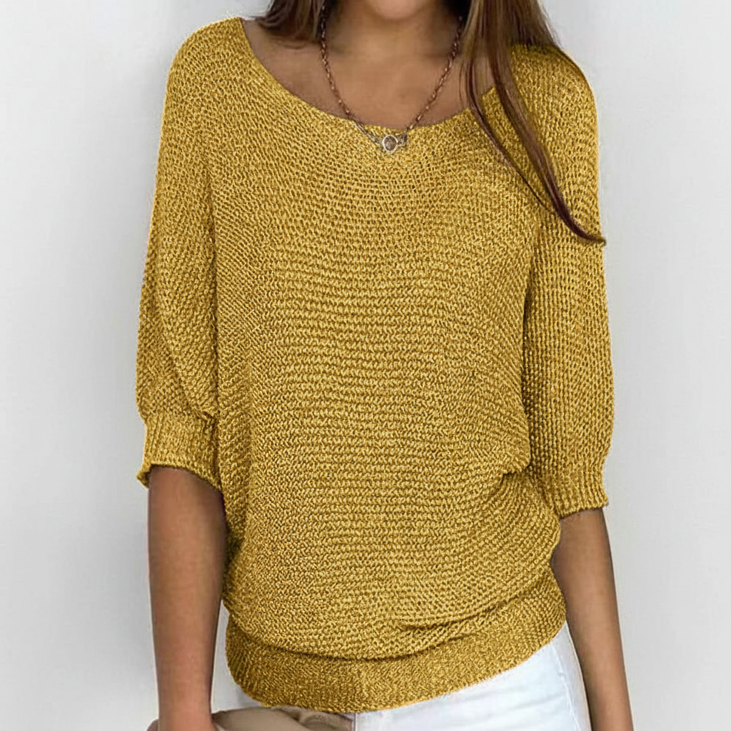 Soft knit batwing sleeve sweater for women, versatile and cozy, ideal for winter tops.