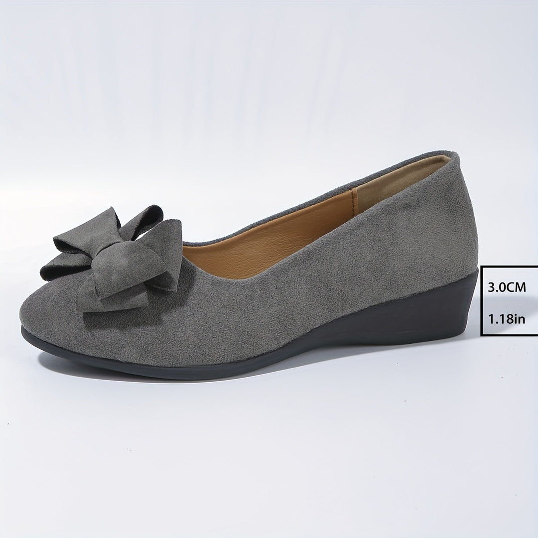 Comfortable gray women's wedge ballet flats, perfect slip-on shoes with a bow.