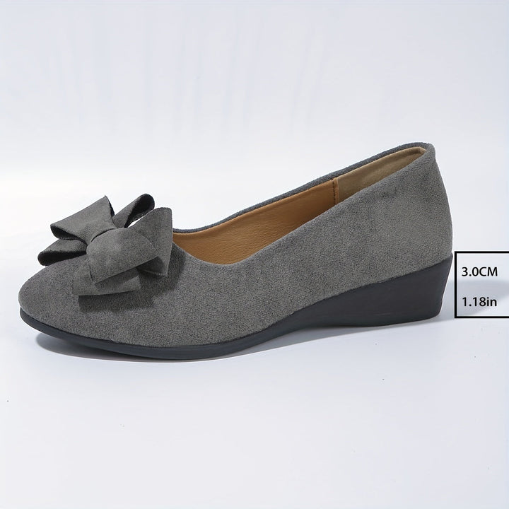 Comfortable gray women's wedge ballet flats, perfect slip-on shoes with a bow.