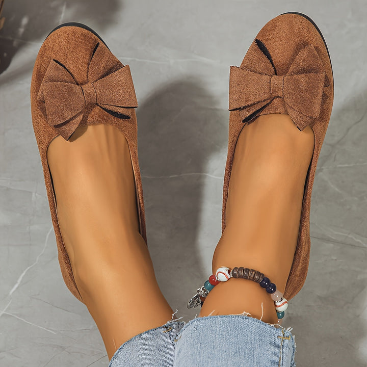 Women's black wedge shoes, ballet flat style, slip-on, designed for all-day comfort.
