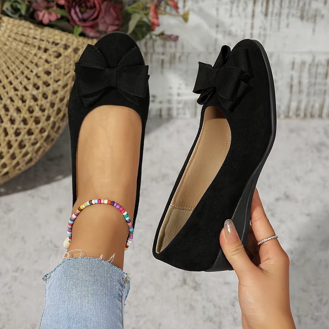 Gray women's slip-on wedge shoes, ballet flats with a round toe and elegant bow detail.