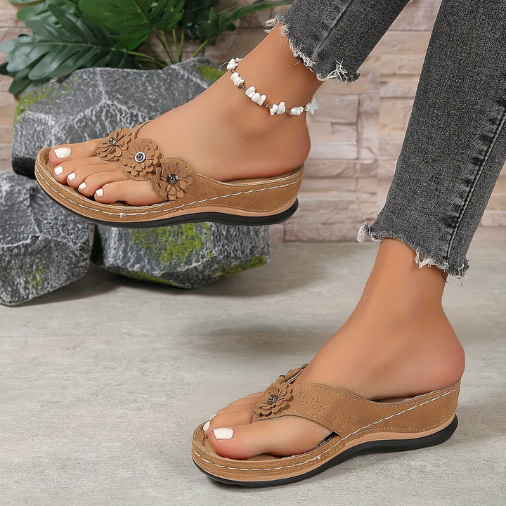 Stylish brown women's summer sandals. Comfortable flat design, perfect for casual everyday wear & warm weather.