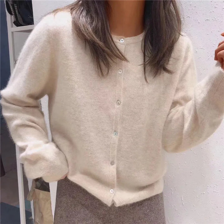 Soft knit women's cardigan with front buttons, perfect for fall layering and ultimate comfort.
