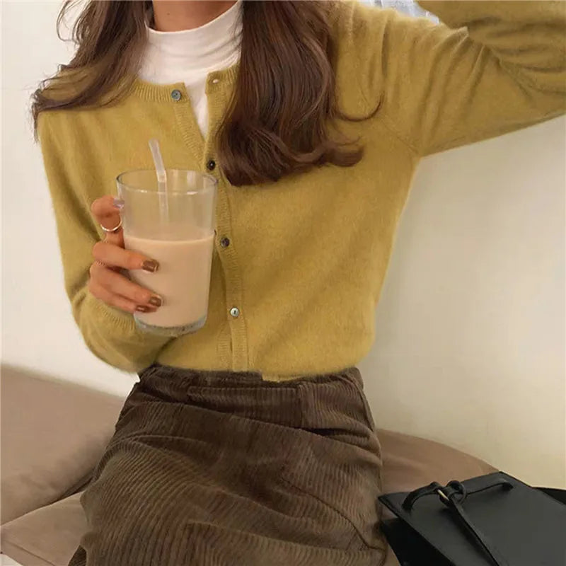 Stylish button-front knitted cardigan for women, offering warmth and versatile everyday comfort.