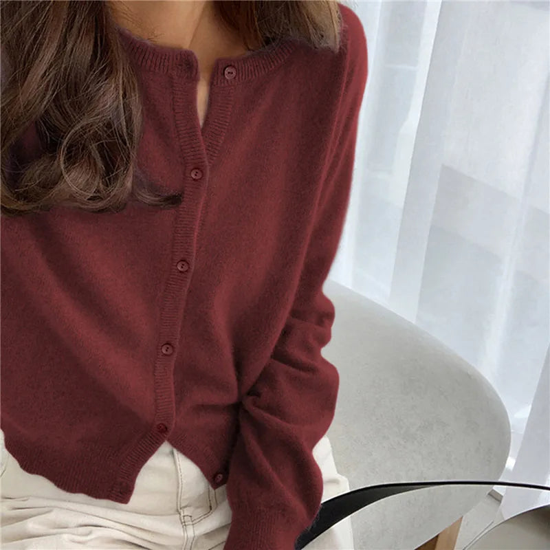 Women's soft knit long-sleeve cardigan, a cozy button-front design for casual layering.