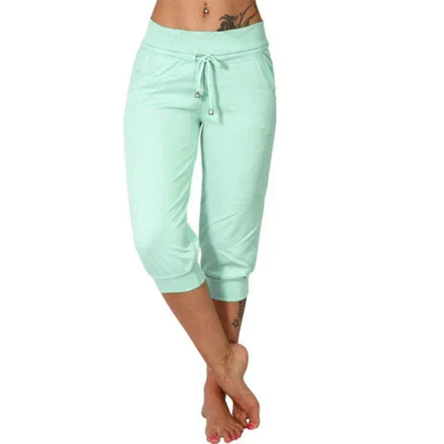 Comfortable women's capri trousers, soft fabric, drawstring waist, perfect for lounging & casual yoga.