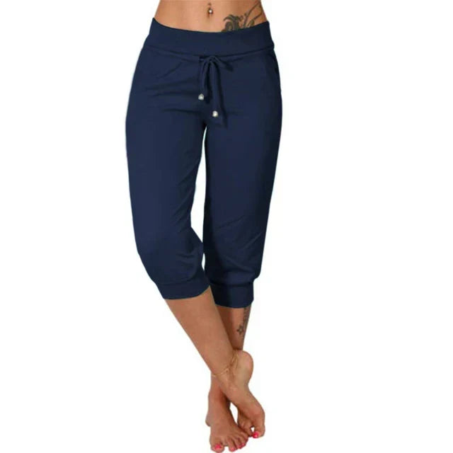 Women's comfortable casual capri pants with drawstring and pockets, essential for everyday comfort.