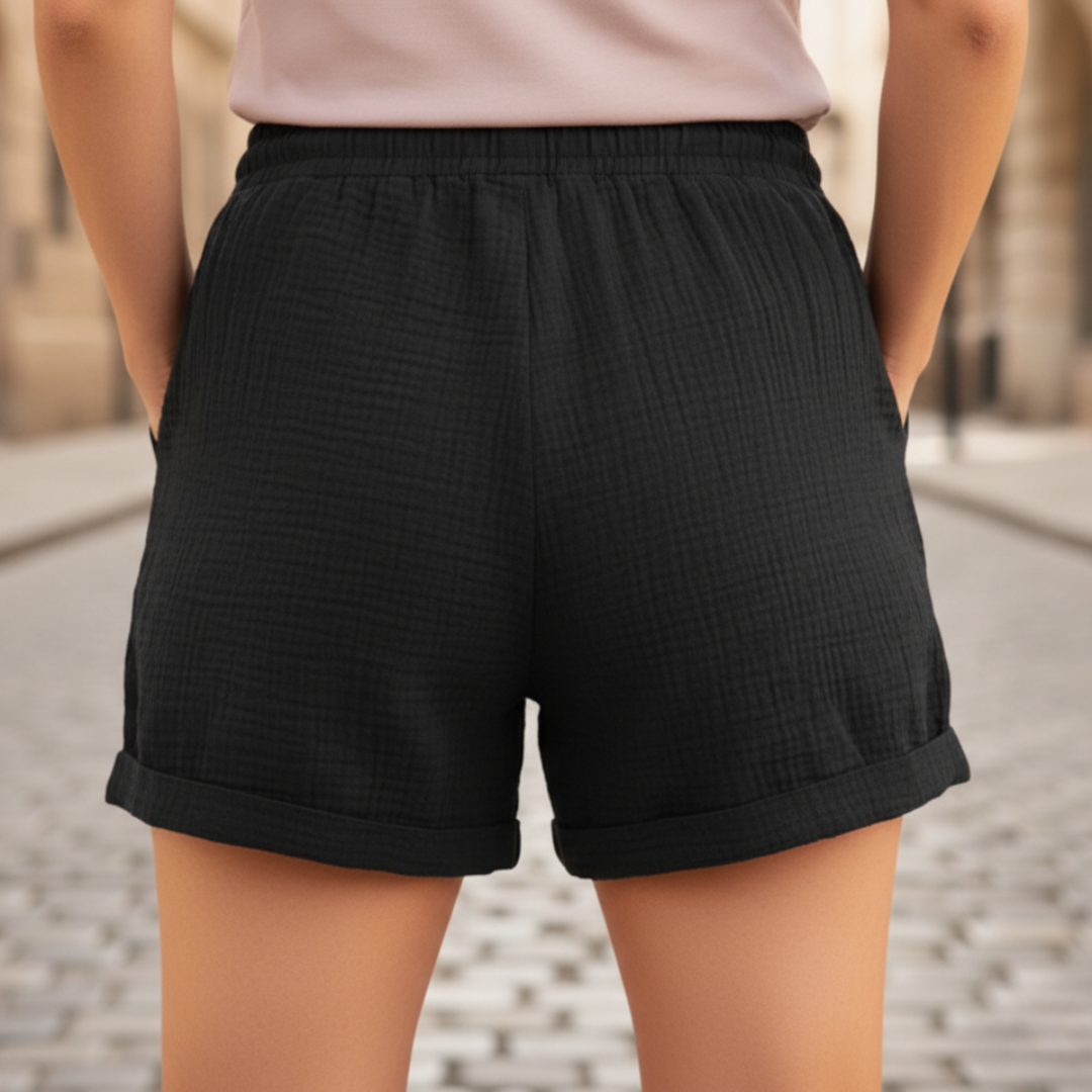 Relaxed fit women's casual shorts with elastic drawstring waist & pockets for everyday comfort.
