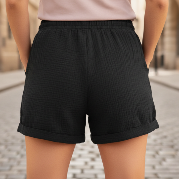 Relaxed fit women's casual shorts with elastic drawstring waist & pockets for everyday comfort.