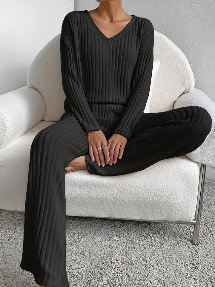 Women's comfortable chill lounge set; relaxed fit v-neck top & wide-leg pants. Perfect for casual wear.