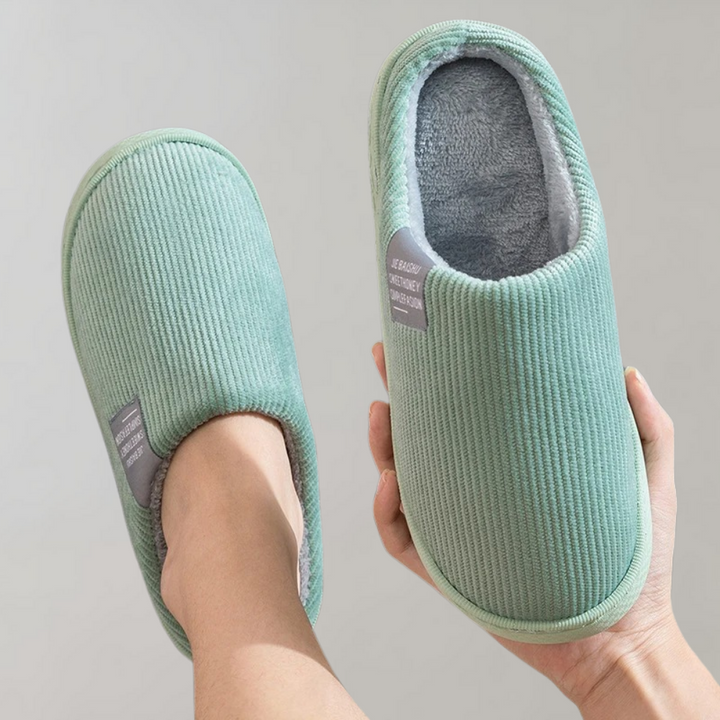 Comfortable women's cloud slide slippers, perfect cozy house shoes for relaxation.