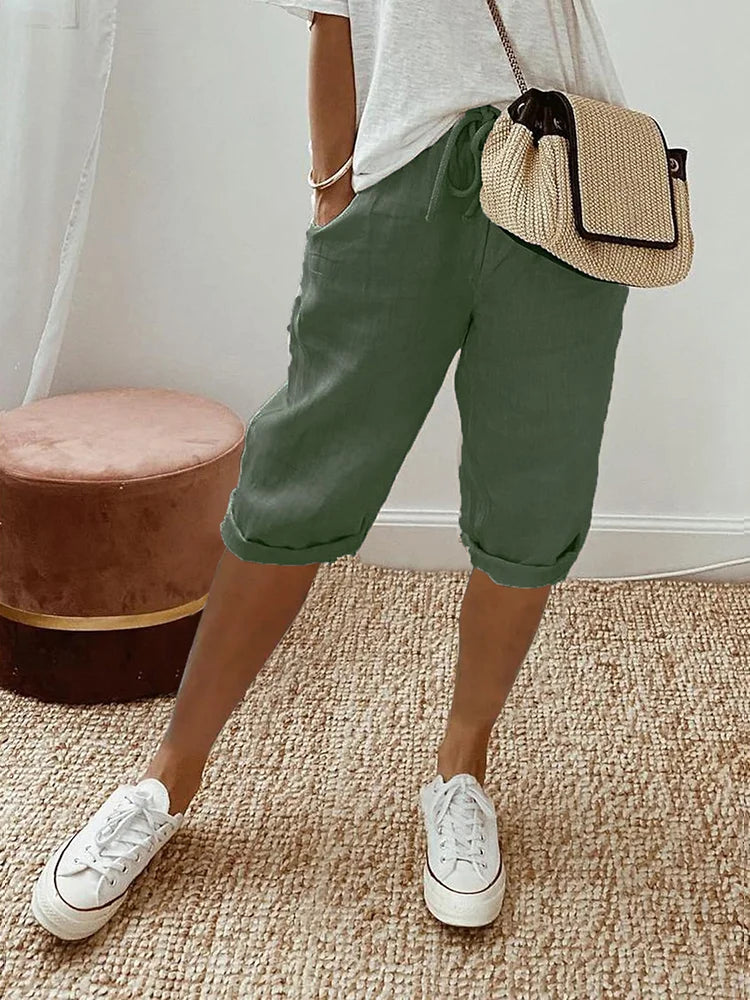 Women's comfortable cotton blend capris for everyday wear, featuring an elastic waist & drawstring for a perfect fit.