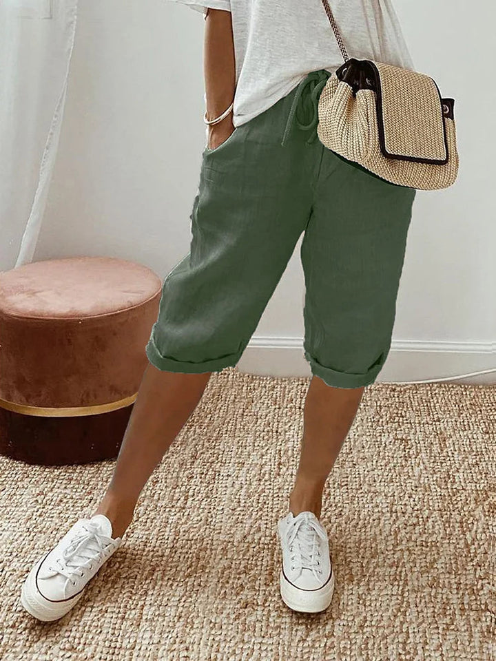 Women's comfortable cotton blend capris for everyday wear, featuring an elastic waist & drawstring for a perfect fit.