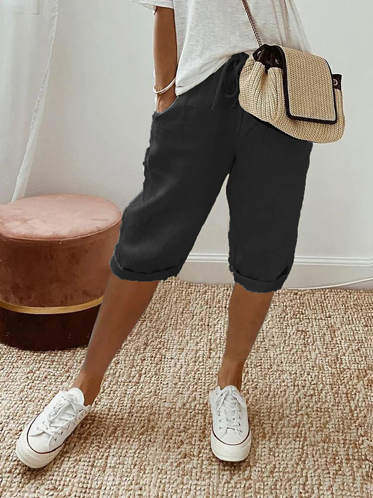 Black women's casual cotton capri trousers, ideal for summer travel and comfortable everyday ladies fashion.