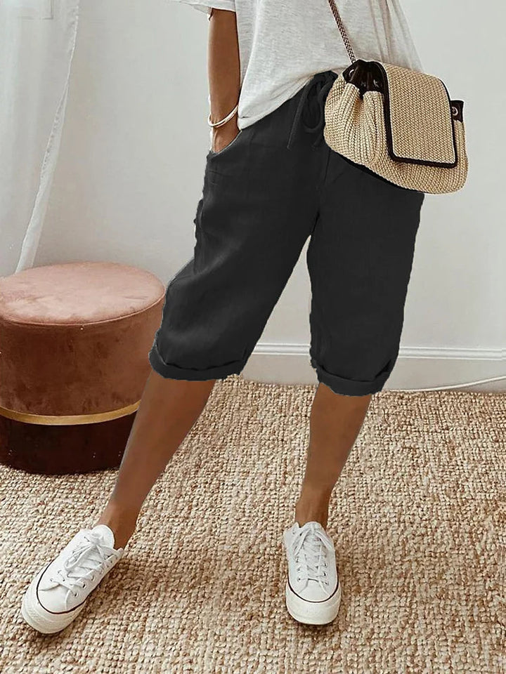 Black women's casual cotton capri trousers, ideal for summer travel and comfortable everyday ladies fashion.