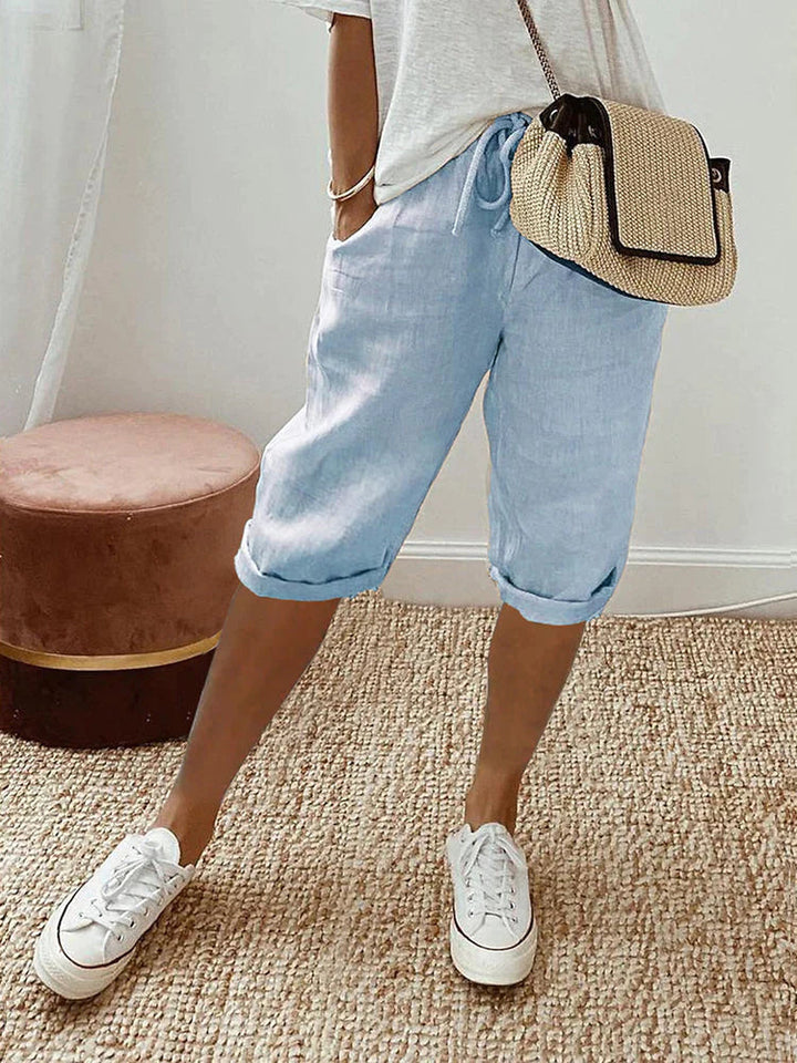 Stylish women's casual capri pants with a comfortable fit, cotton blend, and elastic waist for summer bottoms.