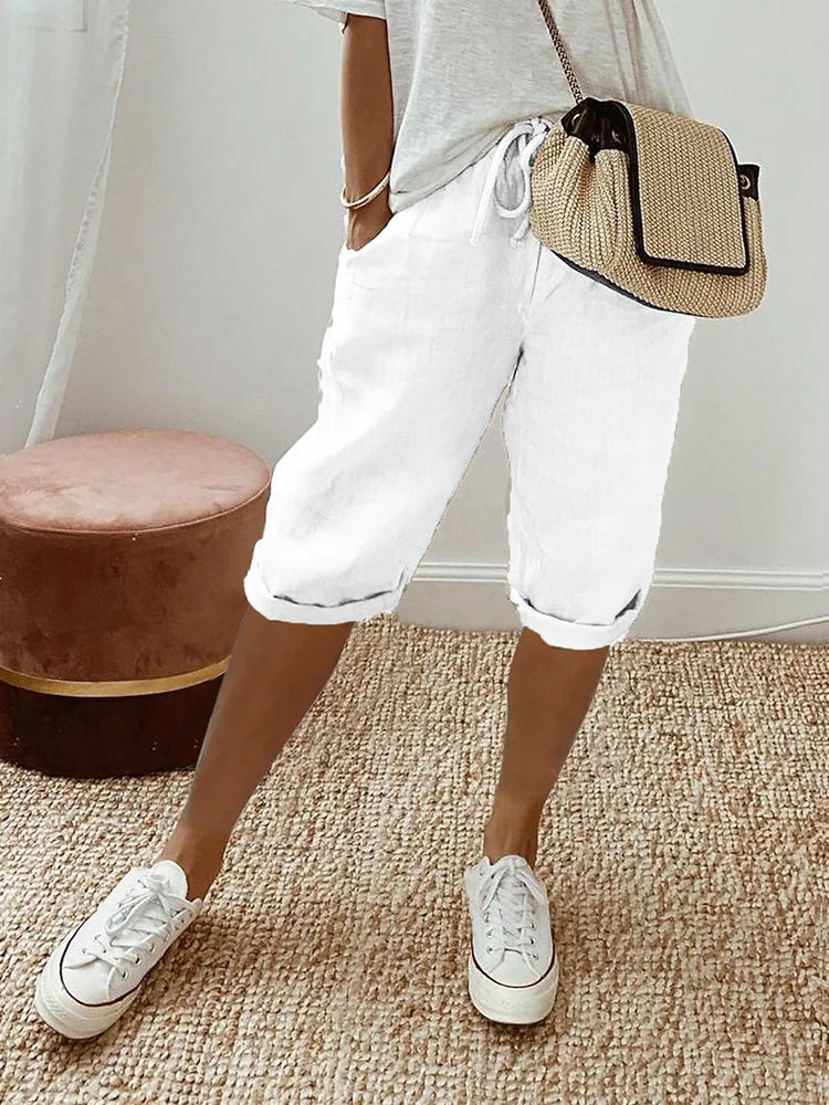 Women's cotton capris with elastic waist & drawstring, comfortable casual pants for summer, travel & everyday wear.