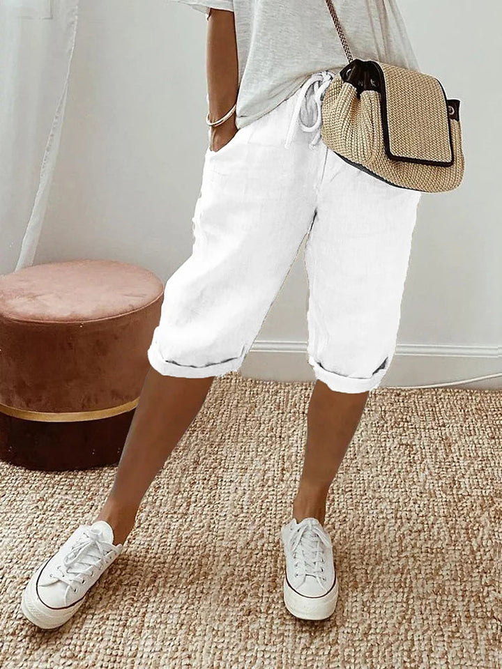 Women's cotton capris with elastic waist & drawstring, comfortable casual pants for summer, travel & everyday wear.