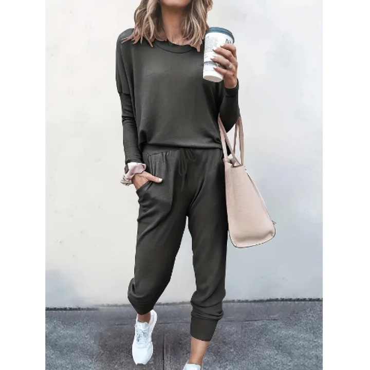 Women's comfortable crew neck jogger set in a stylish solid color, perfect for lounging or casual wear.