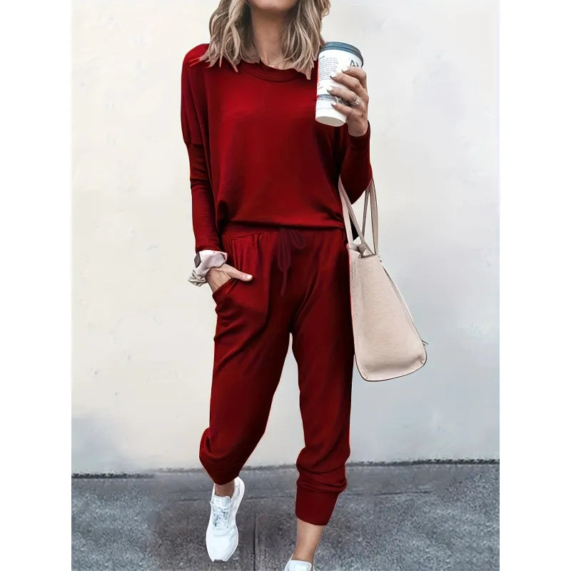 Soft & comfortable women's crew neck jogger set, a stylish two-piece loungewear perfect for relaxation.