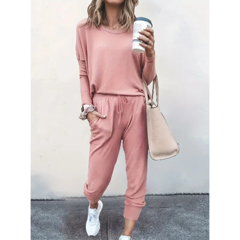Detail of women's comfortable crew neck jogger set, showing fabric texture & fit of the stylish two-piece loungewear.