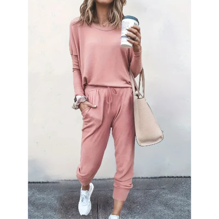 Detail of women's comfortable crew neck jogger set, showing fabric texture & fit of the stylish two-piece loungewear.