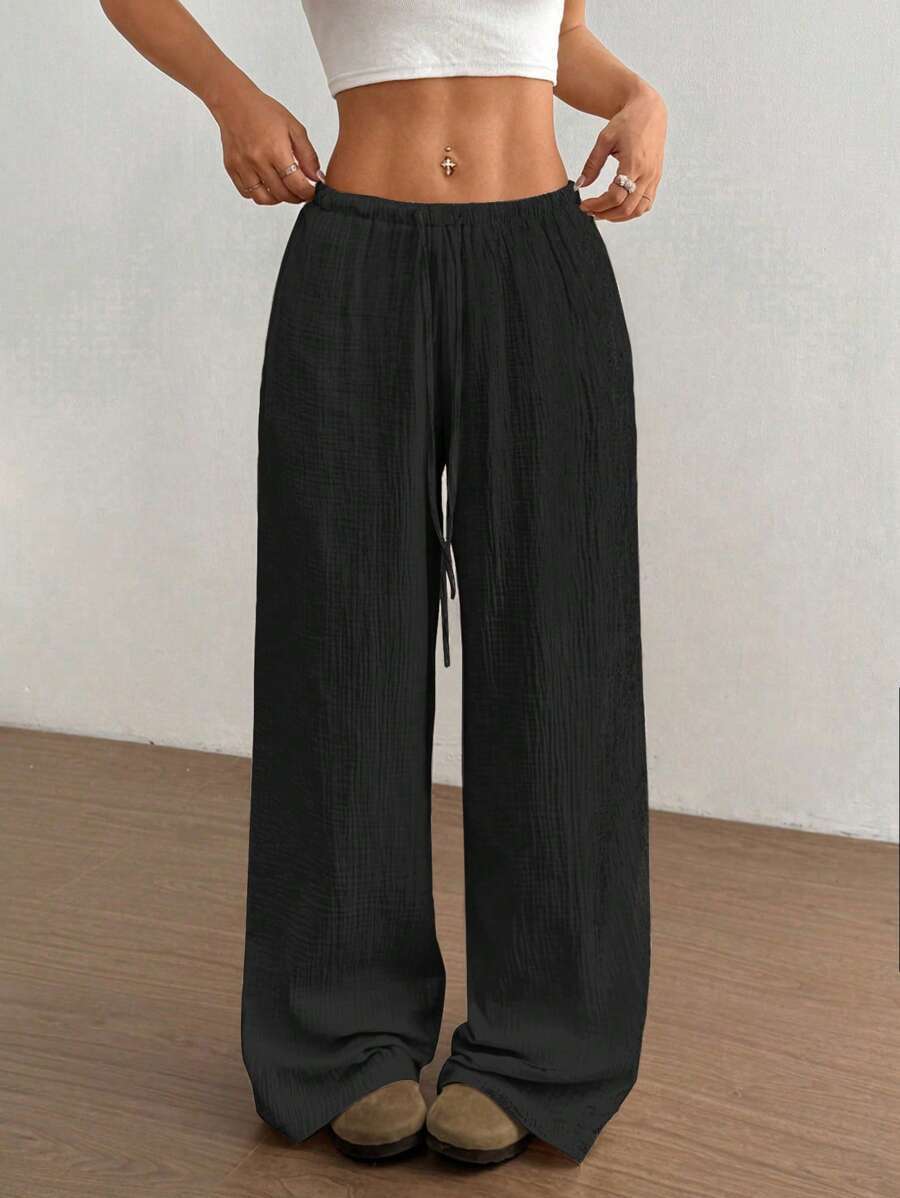Bohemian style crinkle wide leg pants for women, perfect for relaxed casual summer fashion.