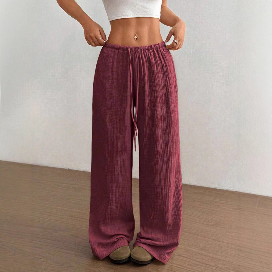 Women's comfortable crinkle wide leg drawstring pants; relaxed fit, elastic waist, and stylish.