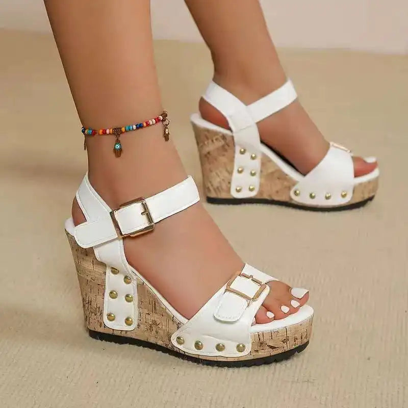 Chic black women's wedge sandals with double buckles. Comfortable orthopedic cork footwear for supportive summer wear.
