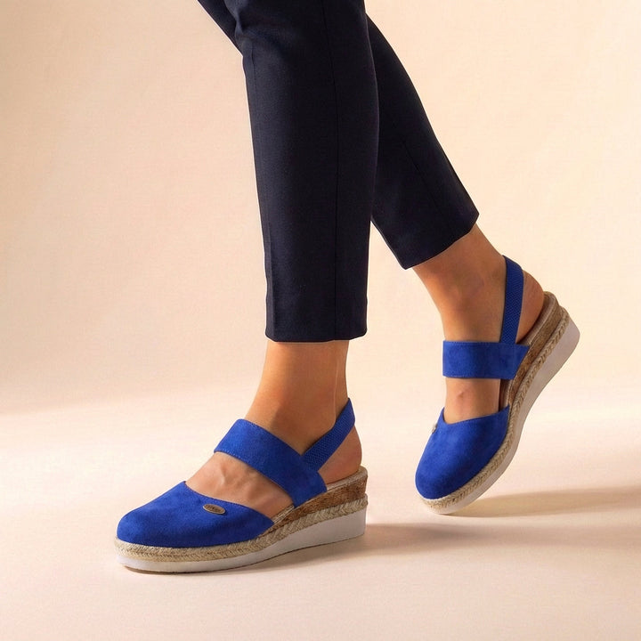Open toe slip-on espadrille platform sandals for women. Comfortable & stylish summer footwear for fashionistas.