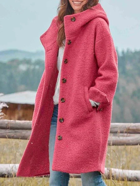Women's comfortable everyday coat in a modern style with button closure and practical pockets, perfect for casual wear.