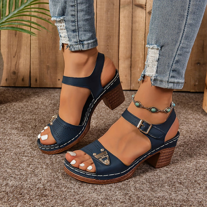 Chic women's casual sandals with a comfortable flat design. Stylish open-toe summer footwear for daily wear.