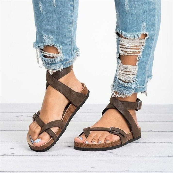 Women's comfortable flat strappy sandals for everyday wear. Ideal casual summer shoes with adjustable buckle.