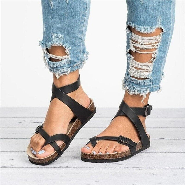 Stylish women's flat strappy sandals with open toe and adjustable buckle. Perfect versatile summer walking shoes.