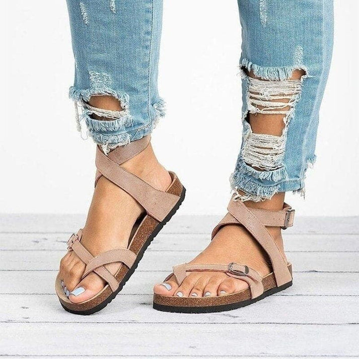 Versatile women's flat strappy sandals. Comfortable casual summer footwear with open toe for everyday adventures.