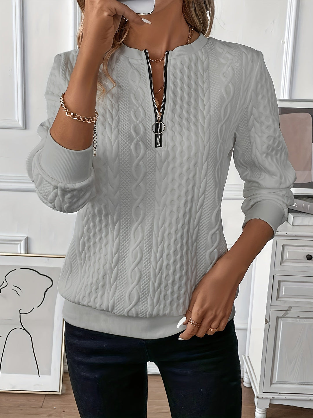 Zip-up women's sweater, cozy soft knit, excellent for fall fashion and warmth.