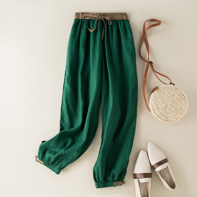 Women's comfortable green harem pants with a relaxed, tapered fit for casual summer wear.