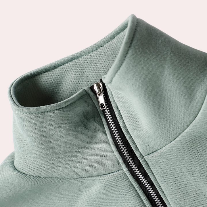 Woman modeling a comfortable green jogging suit set, perfect for casual outings, errands, or relaxation.