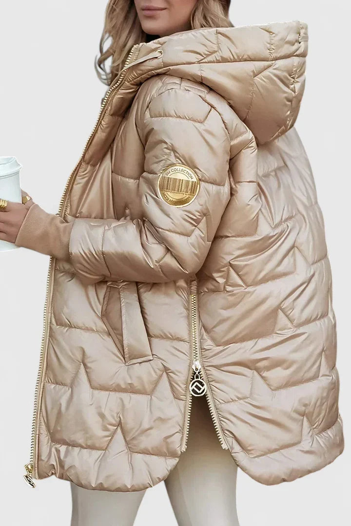 Fashionable women's hooded winter coat. Padded, comfortable, and elegant outerwear for cold seasons.