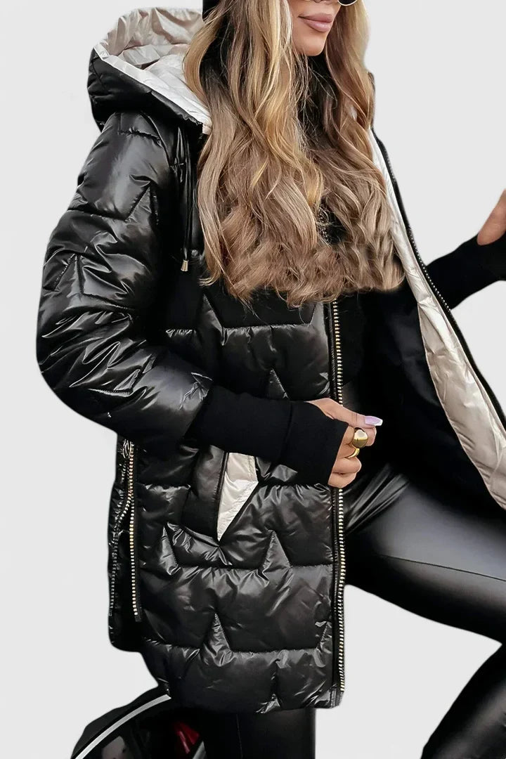 Padded women's hooded autumn winter jacket. Comfortable, elegant, and versatile outerwear fashion.