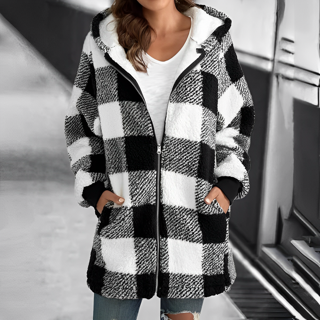 Close-up of a women's hooded coat, highlighting its comfortable design. A stylish & warm fall/winter ladies' jacket.