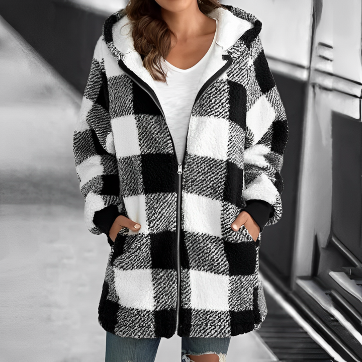 Close-up of a women's hooded coat, highlighting its comfortable design. A stylish & warm fall/winter ladies' jacket.