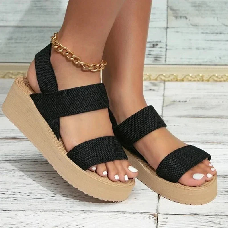 Elegant women's flat sandals for summer. Perfect casual footwear for beach, vacation & warm weather.