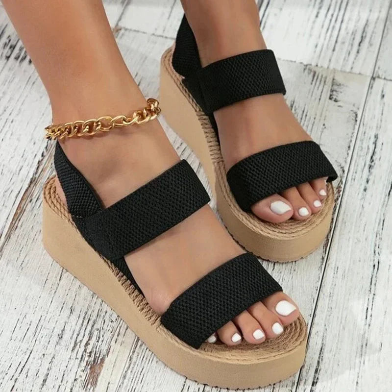 Comfortable women's flat sandals, ideal for summer beach walks or chic vacation style.
