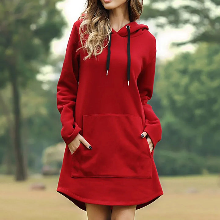 Cozy women's long hooded dress with practical pockets, ideal for loungewear or fall/winter casual outings.