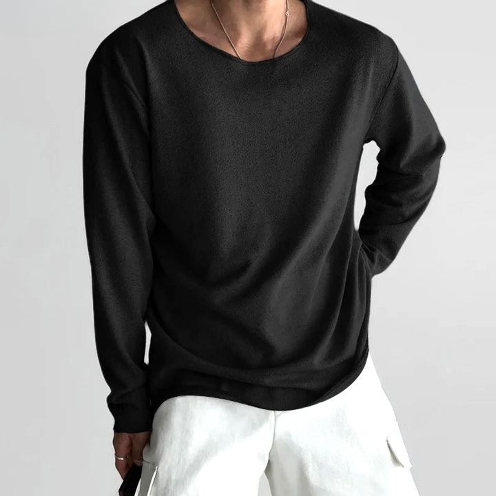 Minimalist women's long-sleeve tee, designed for comfort & breathable everyday wear. Relaxed fit t-shirt.