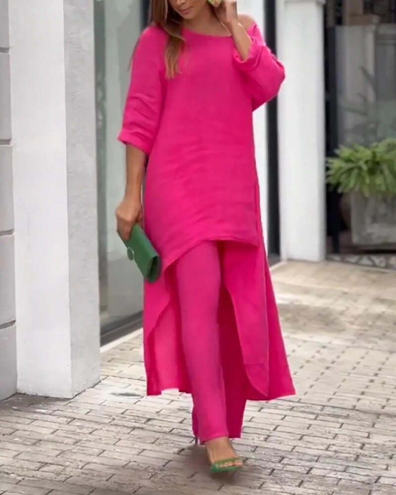 Women's comfortable luxe leisure set in pink, a stylish two-piece loungewear outfit made with breathable fabric.