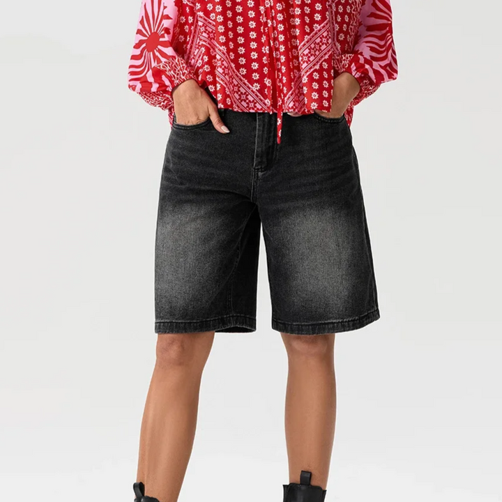 Comfortable women's Bermuda shorts, mid-waist design for stylish summer and everyday wear.