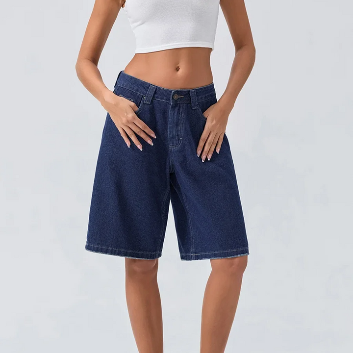 Stylish women's Bermuda shorts, mid-waist & comfortable, essential for warm weather outfits.